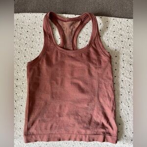 Swiftly tank race length size 4